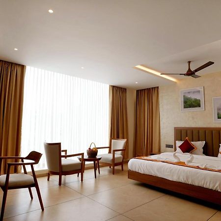 Bluemist Resorts Athirappilly Buitenkant foto