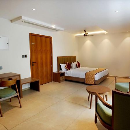 Bluemist Resorts Athirappilly Buitenkant foto