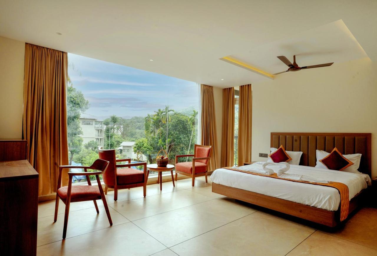 Bluemist Resorts Athirappilly Buitenkant foto