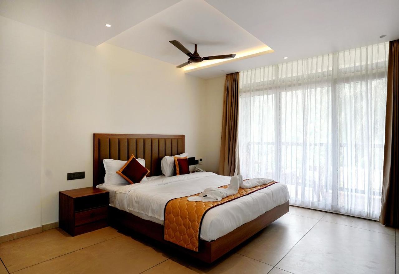 Bluemist Resorts Athirappilly Buitenkant foto