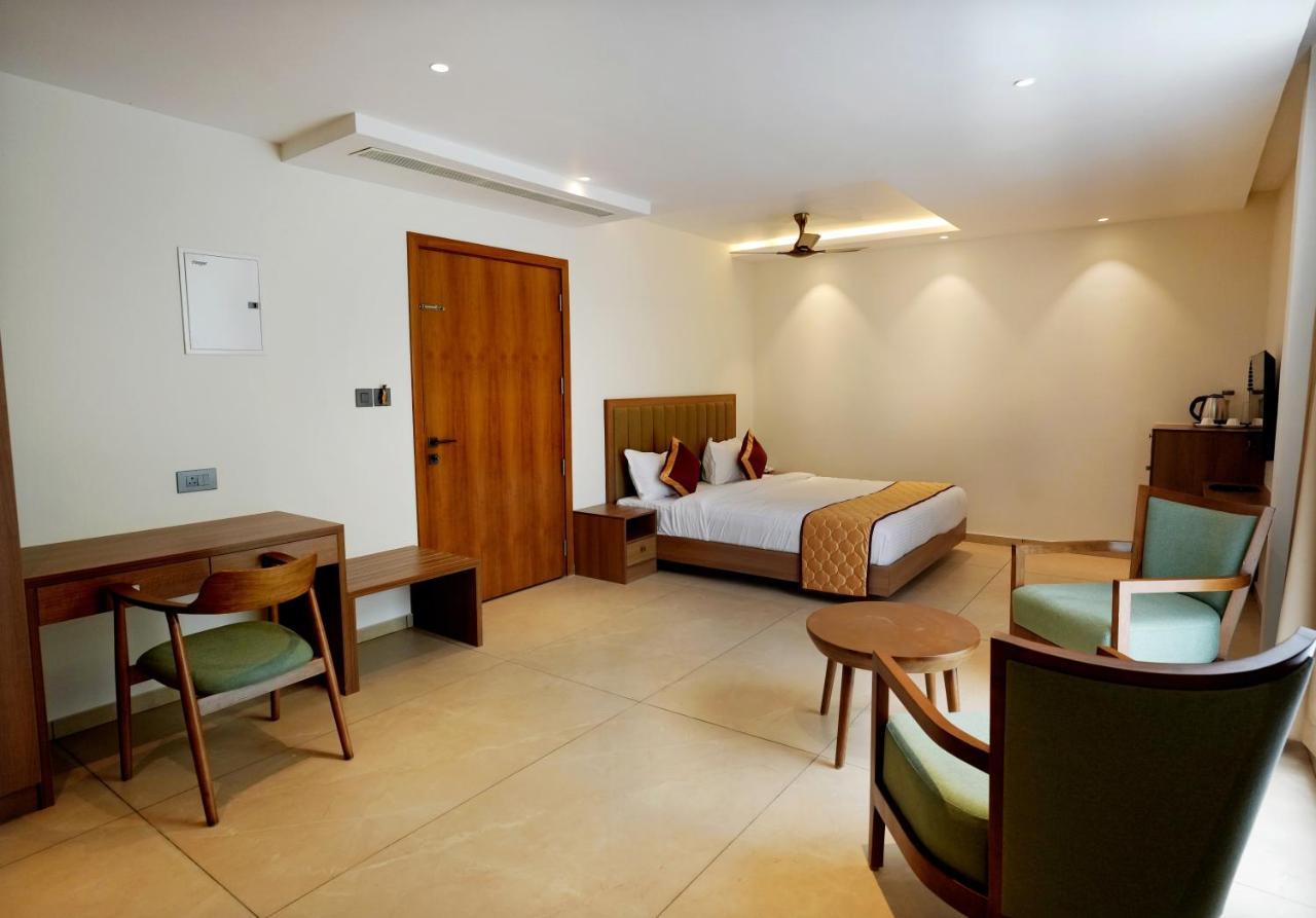 Bluemist Resorts Athirappilly Buitenkant foto