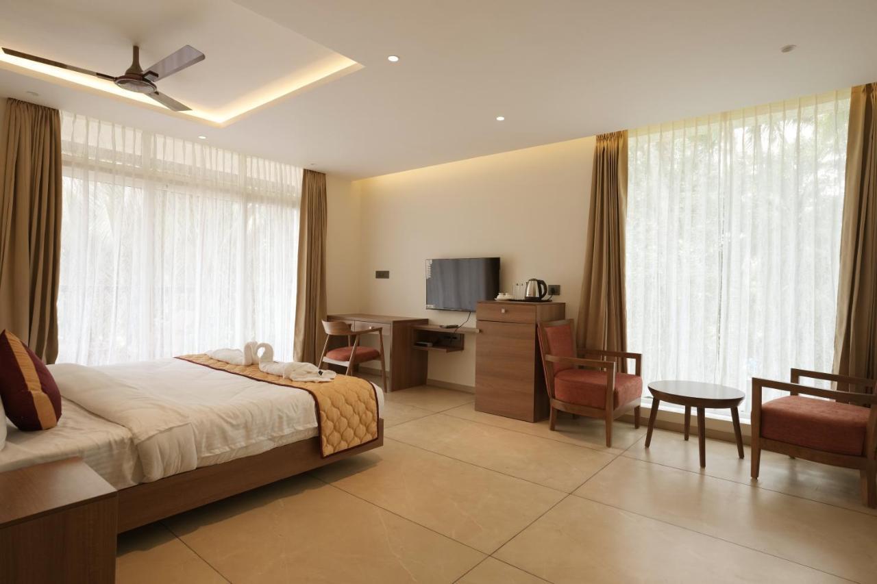 Bluemist Resorts Athirappilly Buitenkant foto