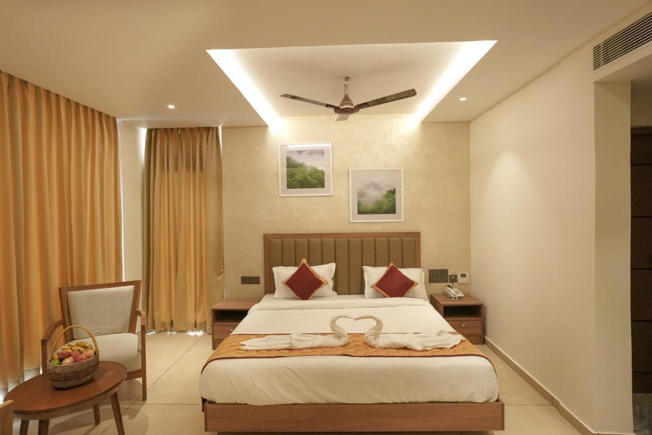 Bluemist Resorts Athirappilly Buitenkant foto