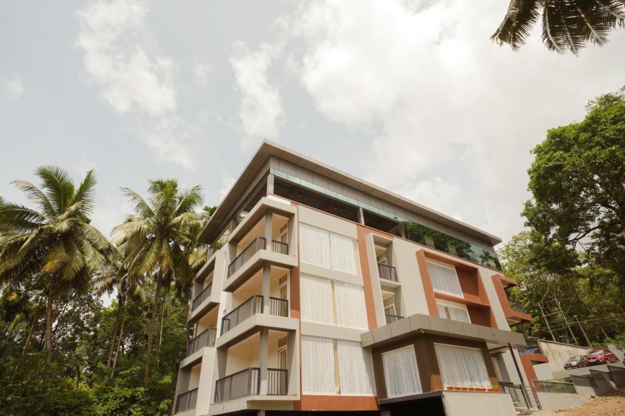 Bluemist Resorts Athirappilly Buitenkant foto