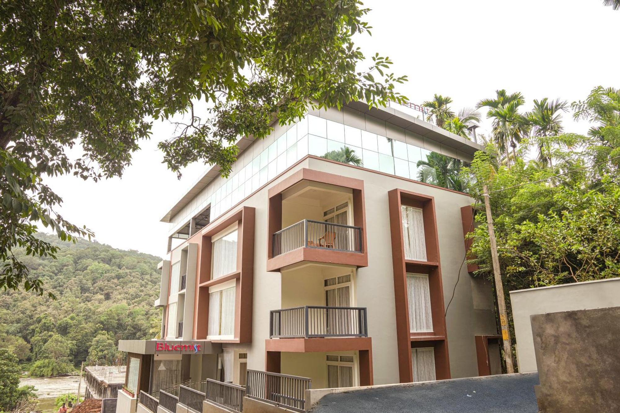 Bluemist Resorts Athirappilly Buitenkant foto