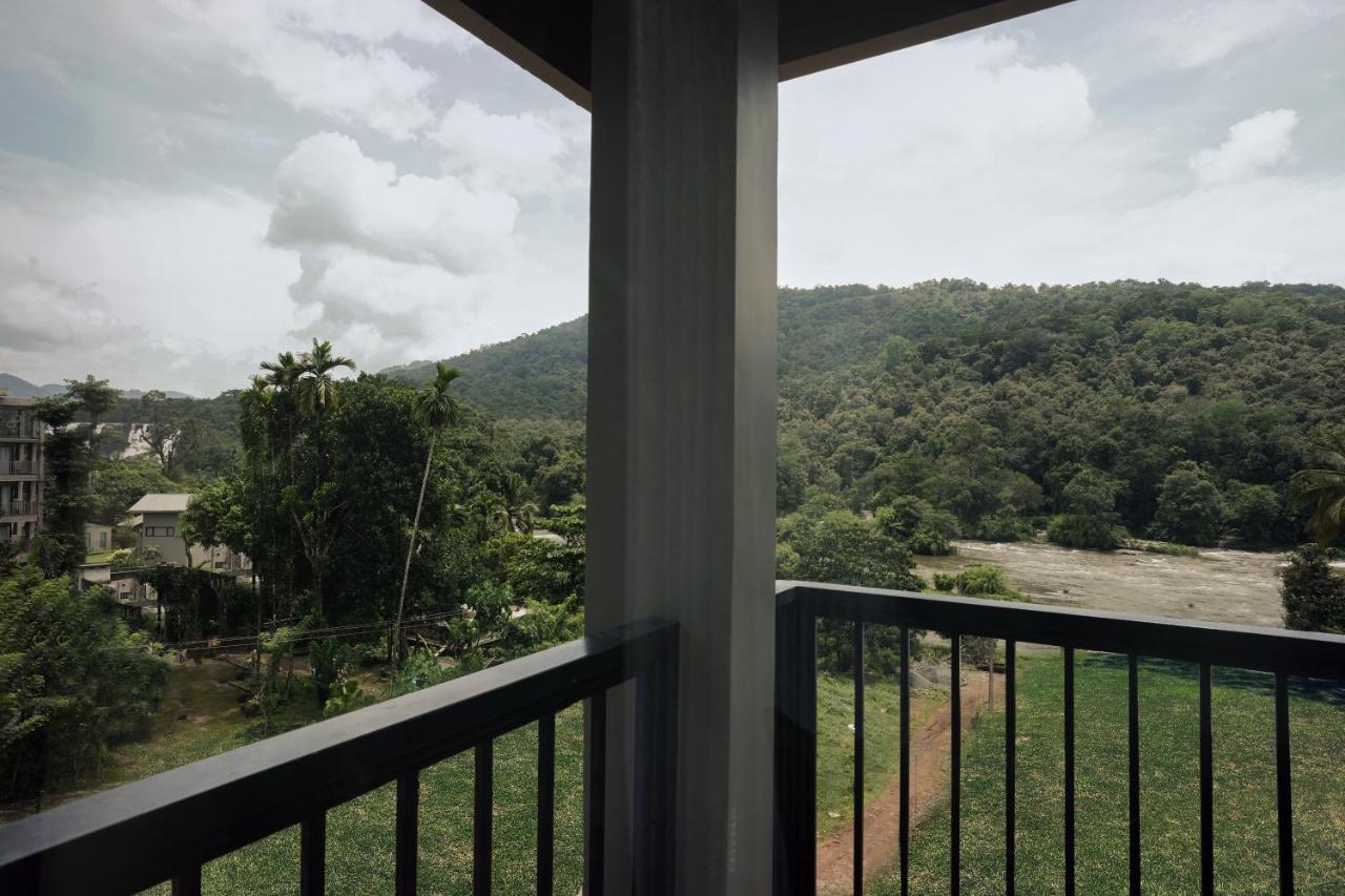 Bluemist Resorts Athirappilly Buitenkant foto