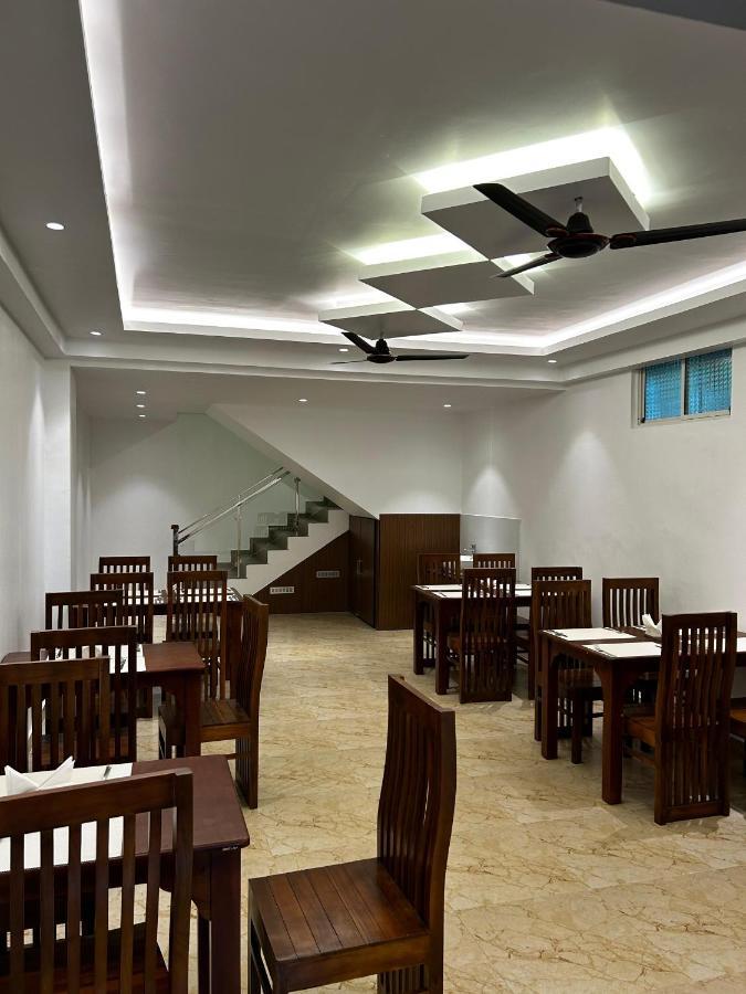 Bluemist Resorts Athirappilly Buitenkant foto